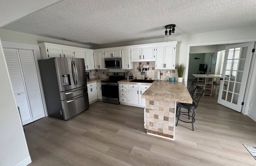 Stuart House | Breezy 4BR w/Golf Clubs + Heated Pool + Tiki Bar