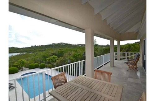 Providenciales Apartment | Breezy, eco-friendly, with pool and lagoon view