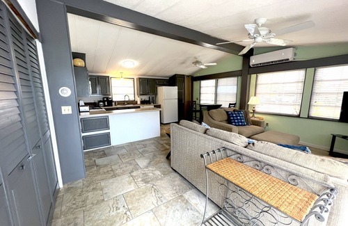 Cudjoe Key Cottage | Breezy Palm 2 bedroom with pool, hot tub, tennis courts, and boat access.