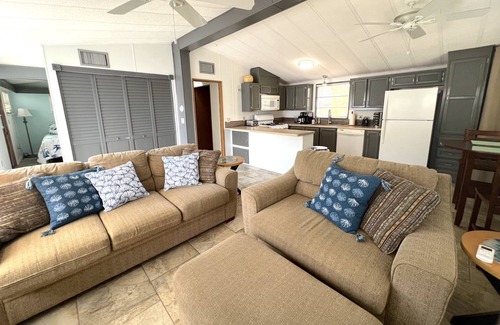 Cudjoe Key Cottage | Breezy Palm 2 bedroom with pool, hot tub, tennis courts, and boat access.