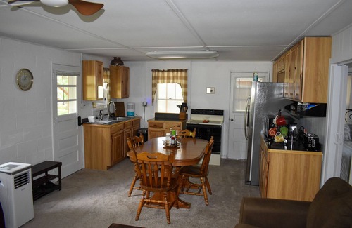 Clear Lake Cabin | Bricks on the Bank-Intimate cabin retreat with river access. 5-stars on Airbnb!