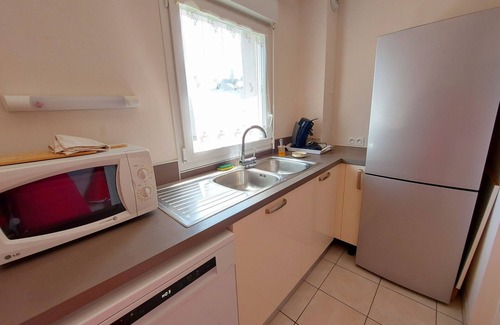 Mayenne Apartment | Bright 2-Bedroom Apartment with Balcony, Garage & Baby Equipment near Mayenne's Attractions