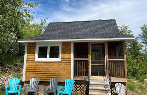 Saint Anns Cabin | Bright and charming cabin on the Cabot Trail overlooking St. Ann’s bay.
