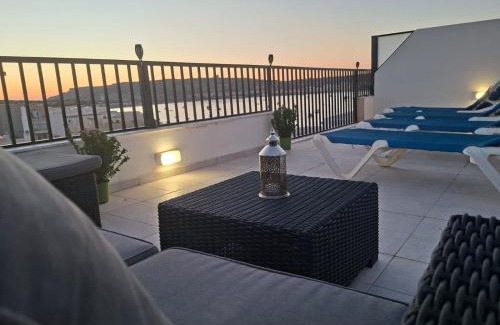 Għadira Apartment | Bright Coastal Penthouse with Huge Terrace Overlooking the Sea- Ghadira Mellieha