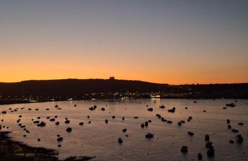Għadira Apartment | Bright Coastal Penthouse with Huge Terrace Overlooking the Sea- Ghadira Mellieha