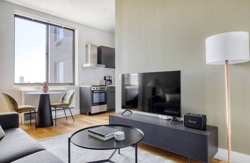 Ukrainian Village Apartment | Bright East Village 1BR w/W/D, on prime corner, by Blueground
