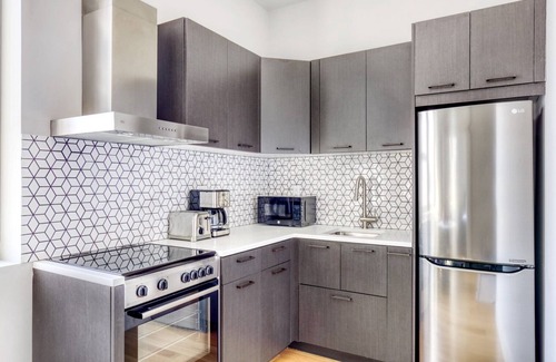 Ukrainian Village Apartment | Bright East Village 1BR w/W/D, on prime corner, by Blueground