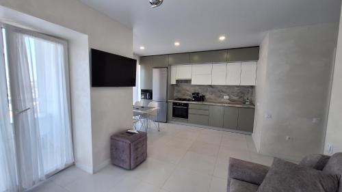 Ternopil Apartment | Bright Gray Нові затишні апартаменти біля центру