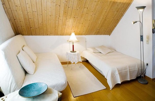 Bregenz Apartment | Bright Holiday Apartment “Ferienwohnung Bregenz 8 Top 4” in Central Location Close to Lake Constance with Wi-Fi, Terrace & Garden
