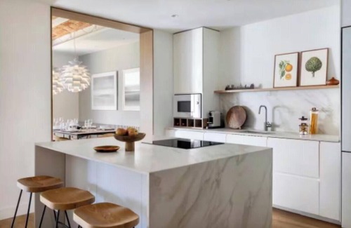 L'Antiga Esquerra de l'Eixample Apartment | Bright Living Spaces with Catalan Charm