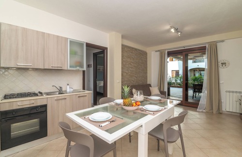 Olbia Apartment | Bright one-bedroom apartment with large garden a few steps from the Olbia waterfront
