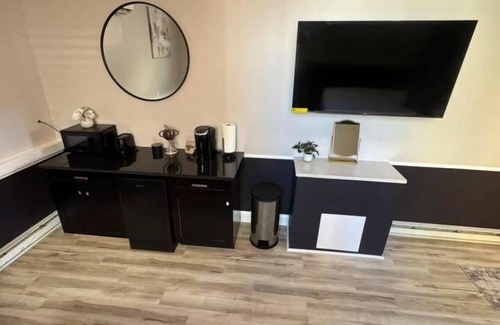 Osage Apartment | Bright & Stylish studio featuring an open layout, sleek finishes & fully furnished comfort.