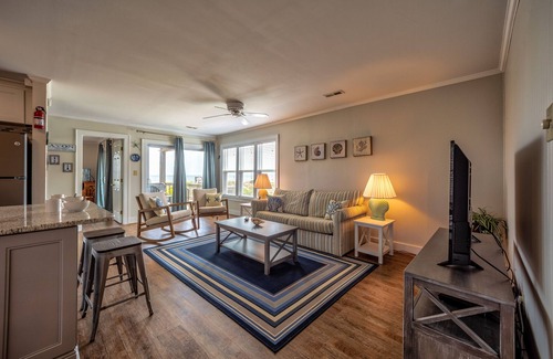 Avon Condo | Bright, updated oceanfront home with shared pool, private deck, & great views