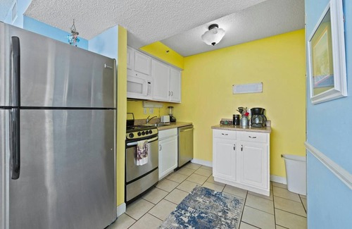 Crescent Beach Condo | Brightly colored oceanfront two-bedroom unit | Carolina Reef - 507