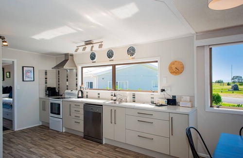 Waihi Beach House | Brighton family bach - sea views, close to beach, park & shops, pet friendly!