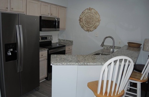 Calabash Condo | Brunswick Plantation Resort and Golf Condo 307M with Outdoor Pool by RedAwning