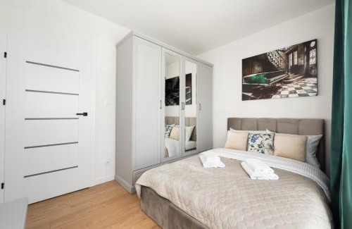 Bialoleka Apartment | Brzeziny Deluxe Apartment by BookingHost