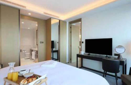 Dubai Apartment | Burj Khalifa and Sea View, Bar, Spa & Restaurant