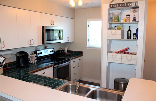 Manteo Condo | BV413 - Remodeled Canal Front Pirate's Cove Paradise
