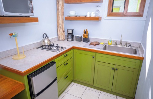 Belize City House | Bze Nature Nook – 2 Private 1BR Suites, Lagoonfront, Gated, 10 Min from Airport