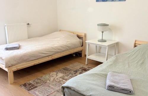 Parilly Apartment | Côté Parc - appt entier neuf et cosy, parking & au pied du métro à Lyon