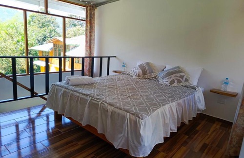 Mindo House | Cabaña Familiar Golden Tanager