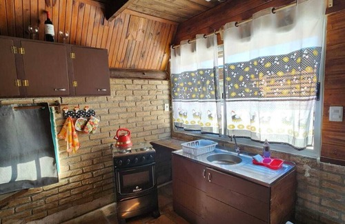 Puimayen Cabin | Cabaña Verde. La Mano
