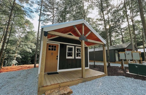 Hartwell RV Rental | Cabin #8: Studio style layout with kitchenette and a large gravel parking pad beside the cabin for easy boat or trailer storage.