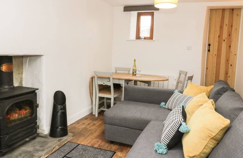 Brough Cottage | CABINTEELY, pet friendly, with open fire in Brough