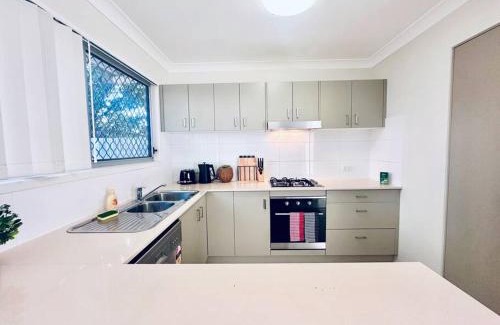 Mango Hill House | Calm Hideaway - Townhouse with Pool Access & Garage