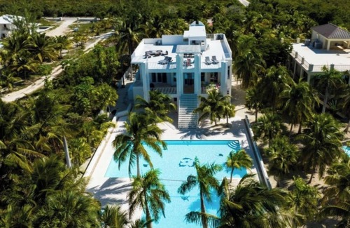 Sandy Point House | Calm Waters - Private Beachfront Villa. No Crowds. Just Ocean.