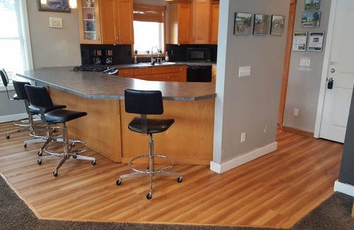 Spring Lake Apartment | Campau upper 3 leve · Lakefront 2 Kings 2 Hot tub(s) spa, fireplace-pit