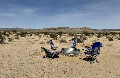 Wonder Valley RV Rental | Campground with fire pit under the stars