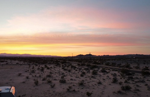 Wonder Valley RV Rental | Campground with fire pit under the stars