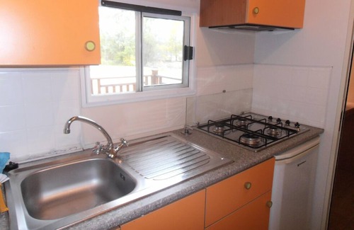 Barza House | Camping Smeraldo Dormeletto Mobilehome Standard with lake view for 4 persons