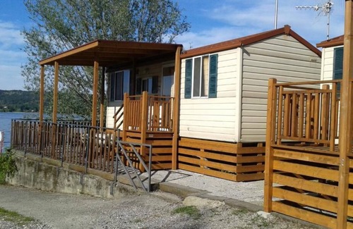 Barza House | Camping Smeraldo Dormeletto Mobilehome Standard with lake view for 4 persons