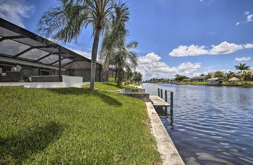 Pelican Cottage | Canal-front Cape Coral Home: Pool & Patio