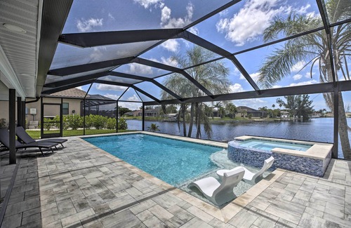 Pelican Cottage | Canal-front Cape Coral Home: Pool & Patio