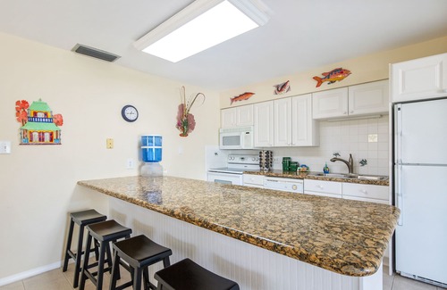 Marathon House | Canal-front, dog-friendly home with heated pool, seawall dock & grill
