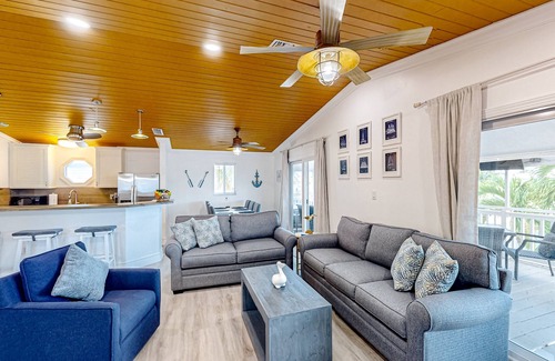 Key Largo House | Canal-front home with private dock, hot tub, water views, kayaks, & deck