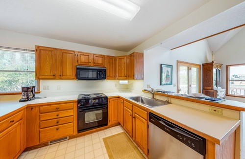 Brigands' Bay House | Canalfront home with a deck, sound access, central AC, WiFi, washer/dryer