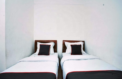 Padang Hotel | Capital O 93467 Wisma Olo Syariah