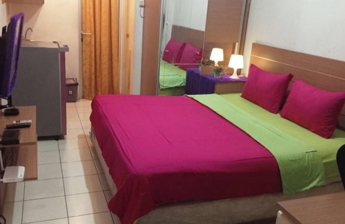 Pondokcina Hotel | Capital O 93937 Aditya Rooms