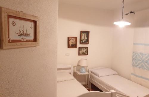 Golfo Aranci Apartment | Capo Figari 9, Appartamento spazioso nel centro di Golfo Aranci con terrazza, Wi-Fi, parcheggio gratuito