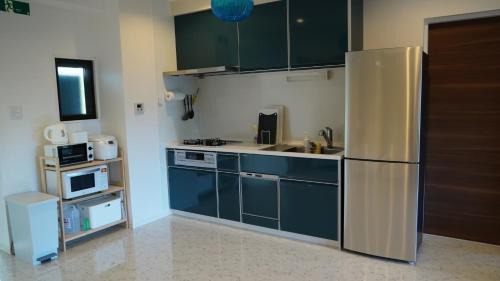 Sakimotobu Apartment | Captain Kangaroo Condo - Vacation STAY 88619v