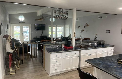 City-by-the Sea House | Captains Quarter/canal front, private pool, dock for two boats.