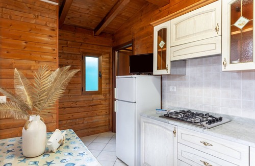 Marina di Massa RV Rental | Caravan "Bungalow Ornella" with Private Terrace & Wi-Fi