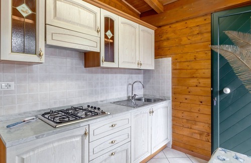 Marina di Massa RV Rental | Caravan "Bungalow Ornella" with Private Terrace & Wi-Fi