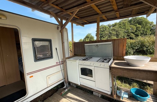 Champsac RV Rental | Caravan 'Vue Sur L'étang' with Lake View, Shared Pool and Private Terrace