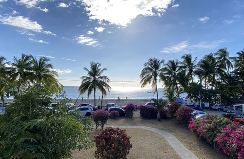 Le Carbet Apartment | Carbet Apartment on the beach side of standing with your feet in the water